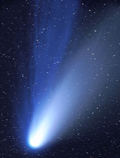 The Dust and Ion Tails of Comet Hale-Bopp