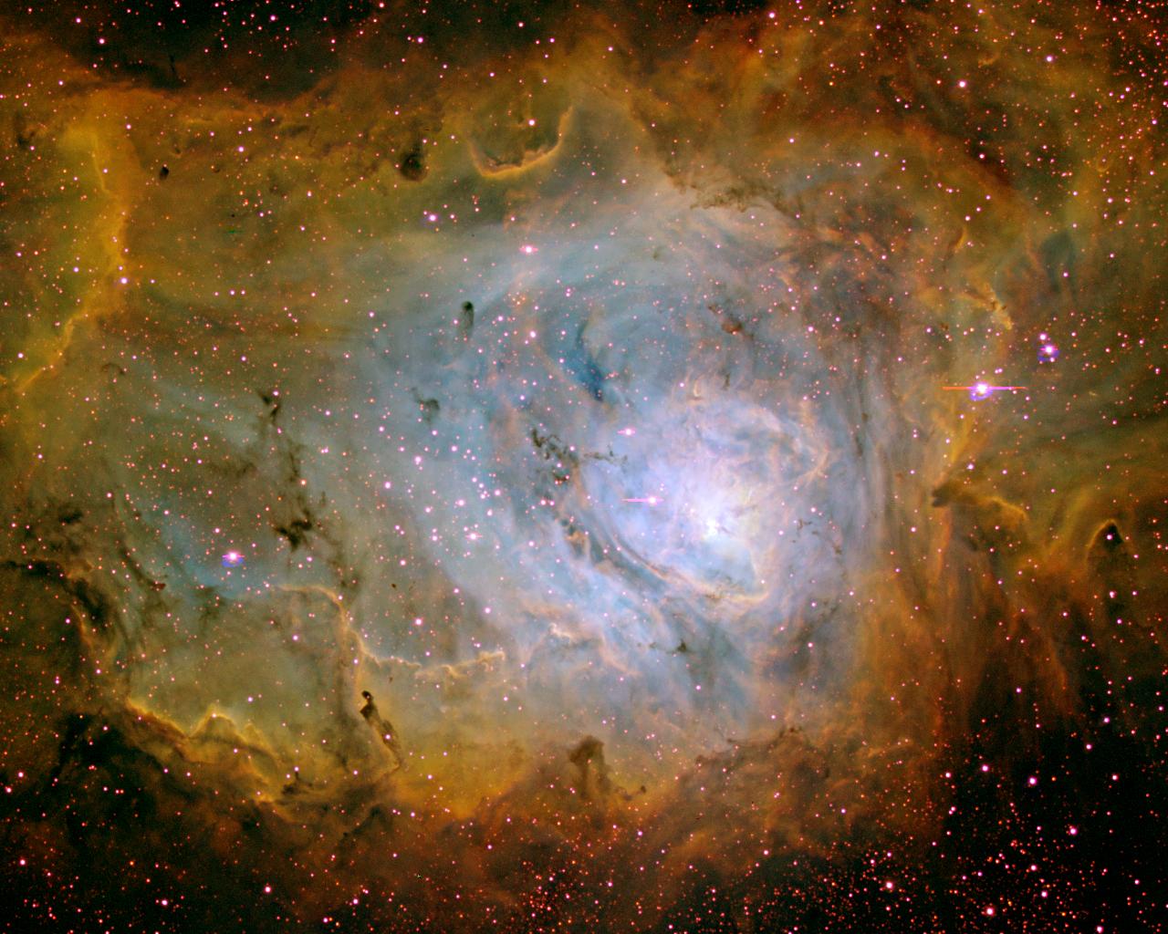 The Lagoon Nebula in Three Colors