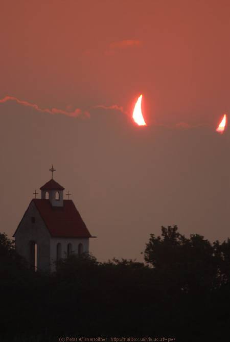 Clouds and the Moon Move to Block the Sun