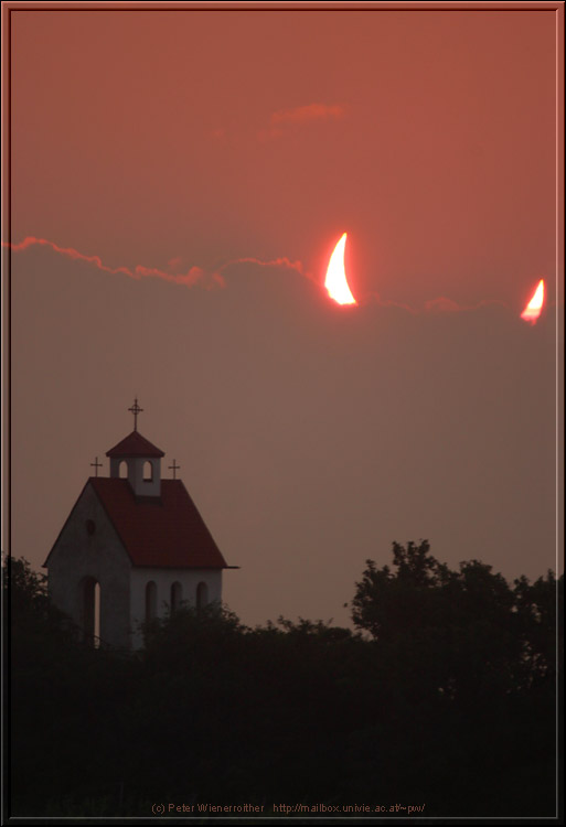 Clouds and the Moon Move to Block the Sun