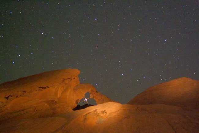 Mars Rising Through Arch Rock