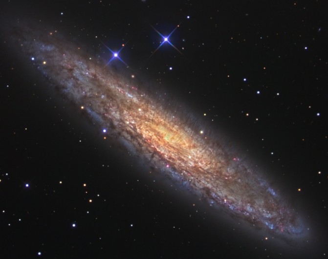 NGC 253: Dusty Island Universe