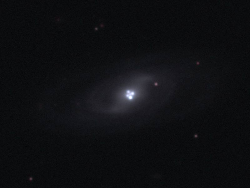 The Einstein Cross Gravitational Lens