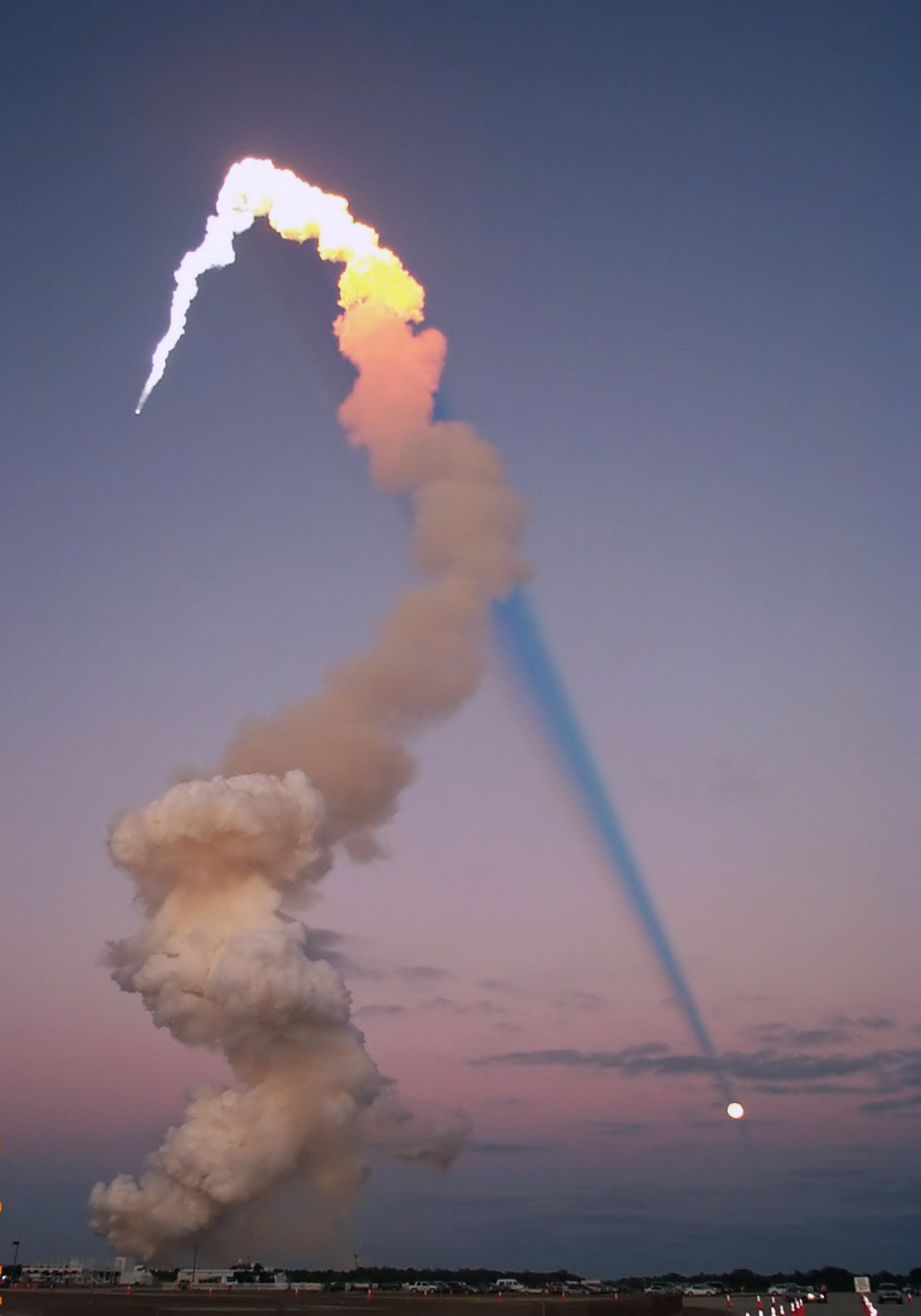 Shuttle Plume Shadow Points to Moon
