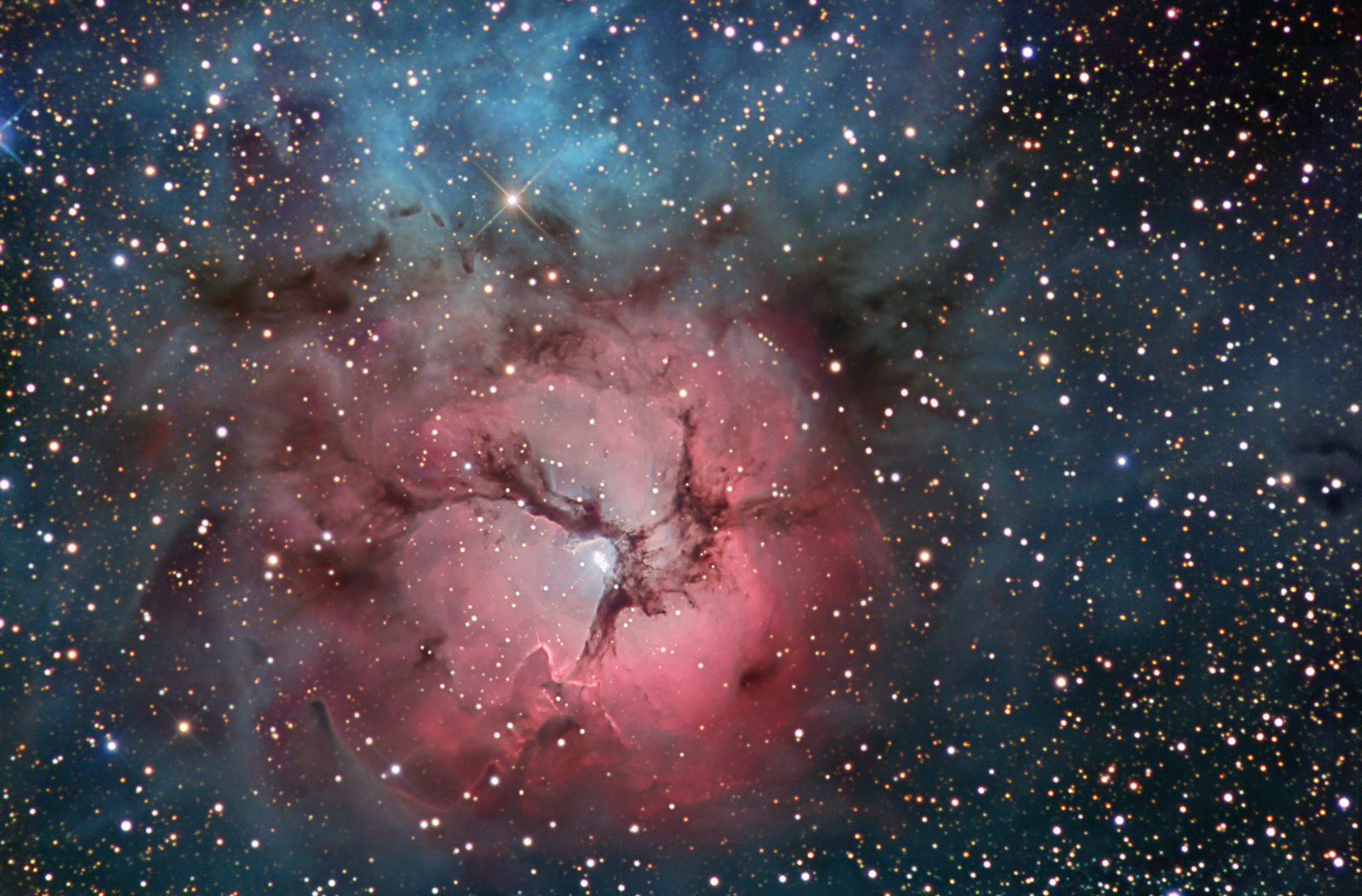 The Trifid Nebula in Stars and Dust