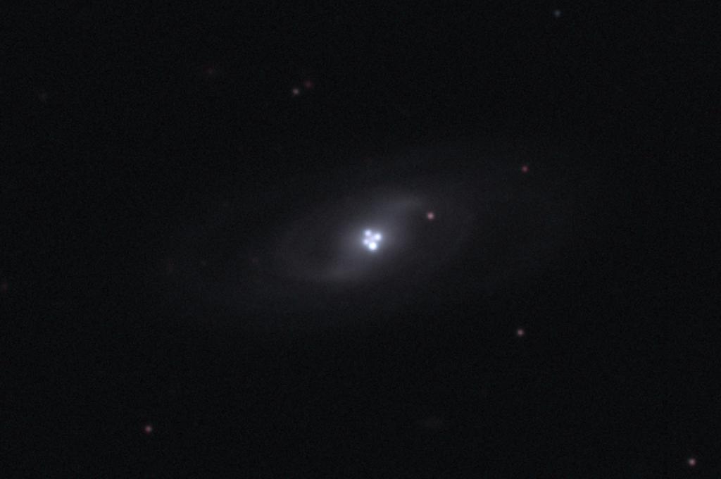 The Einstein Cross Gravitational Lens
