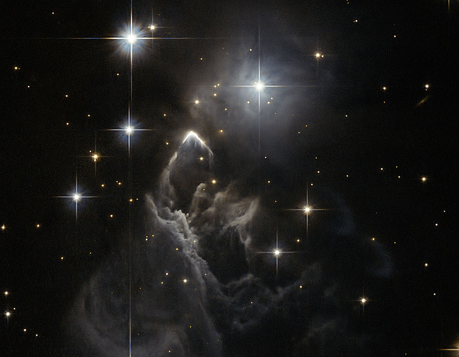 IRAS 05437+2502: An Enigmatic Star Cloud from Hubble