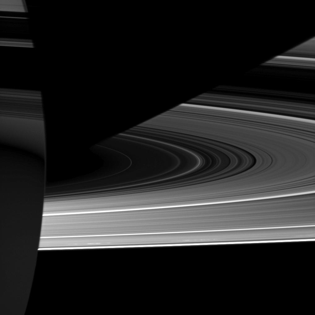 Saturn: Light, Dark, and Strange