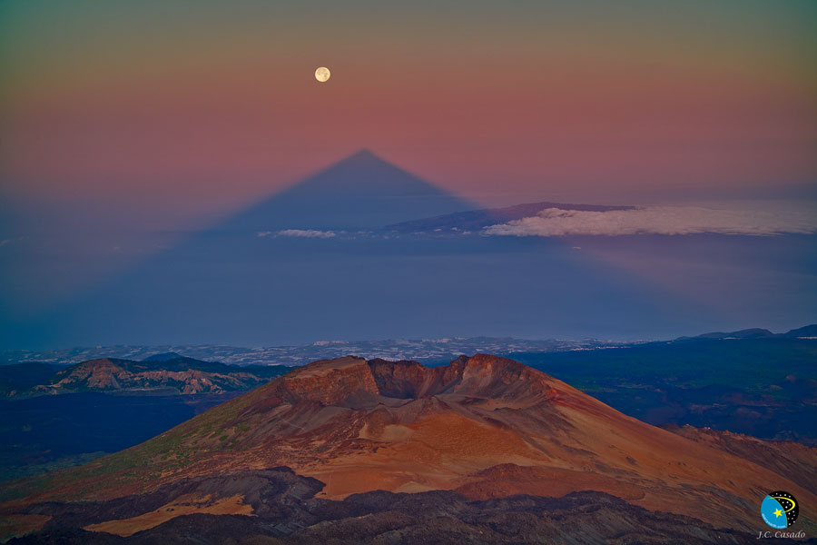 A Triangular Shadow of a Large Volcano