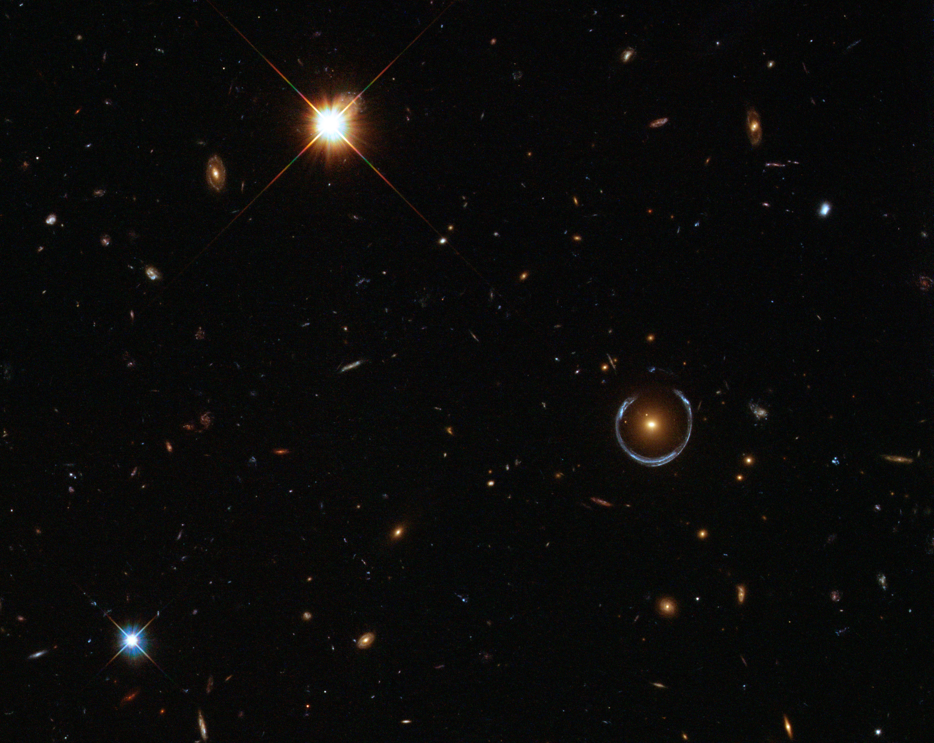 A Horseshoe Einstein Ring from Hubble