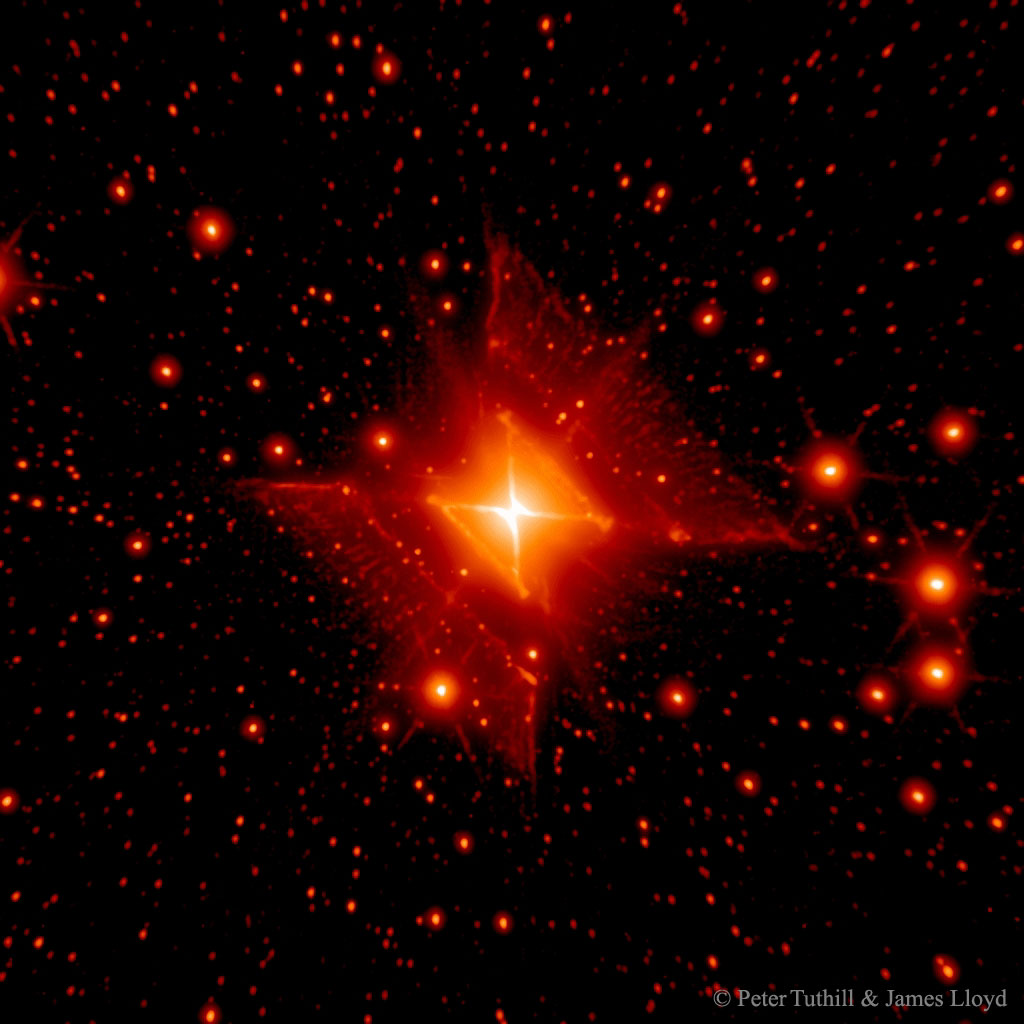 MWC 922: The Red Square Nebula
