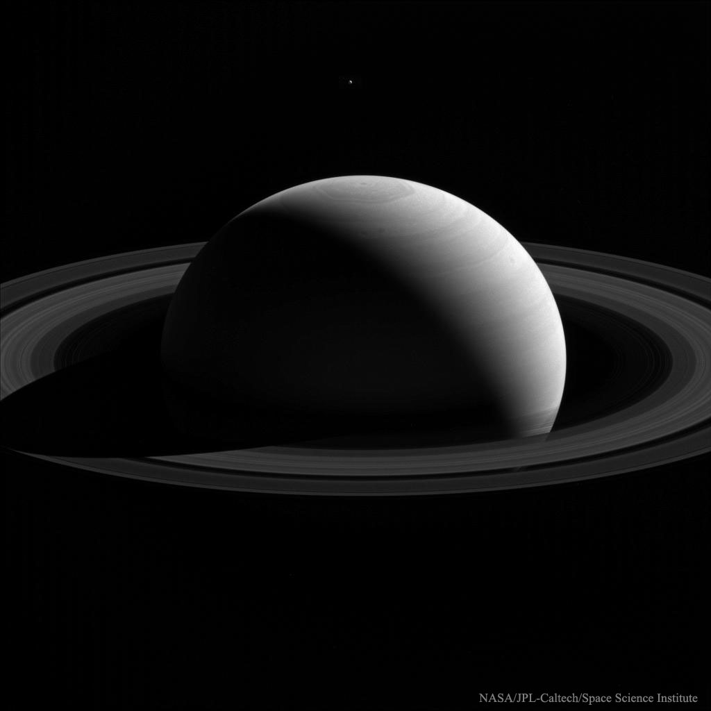 Behind Saturn