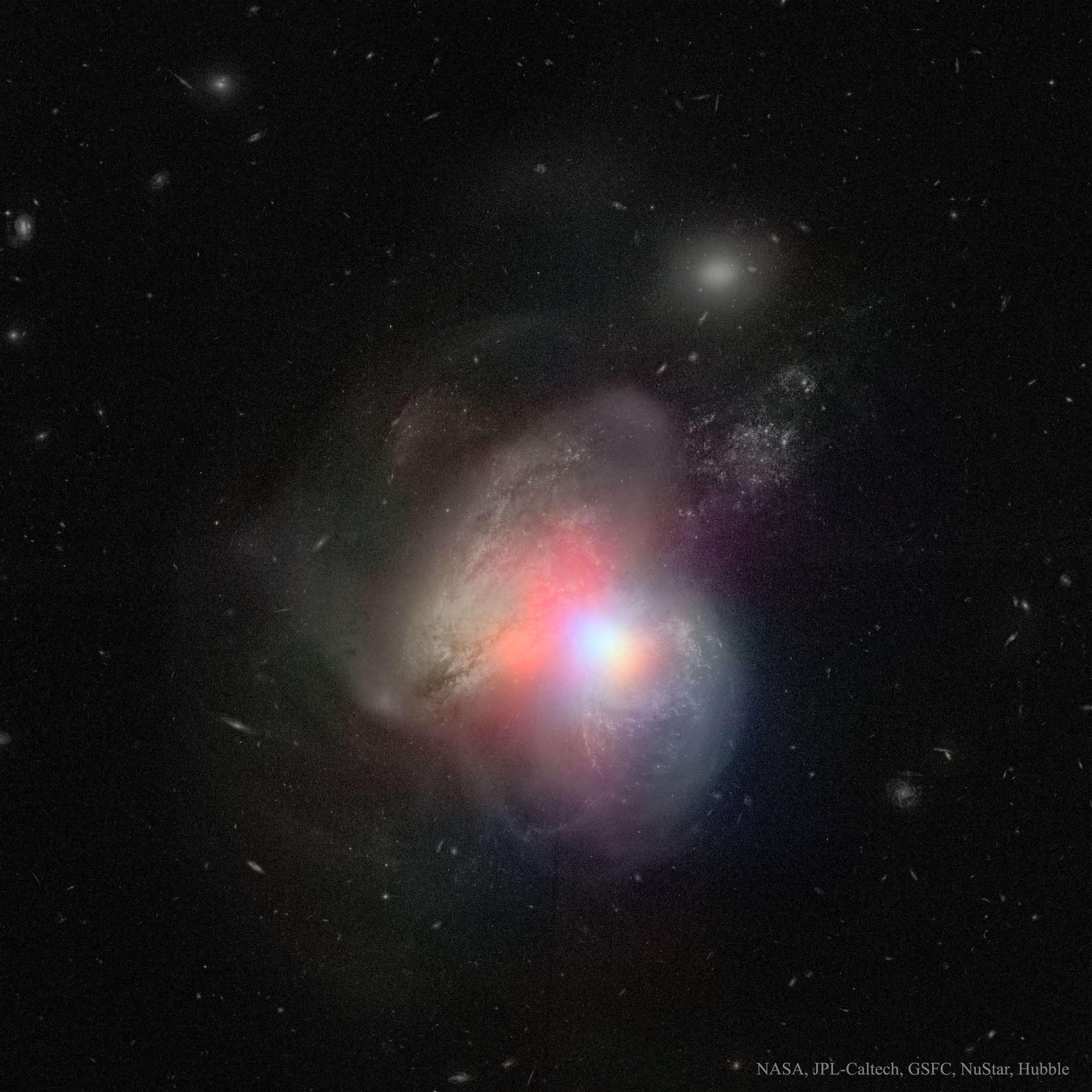 Arp 299: Black Holes in Colliding Galaxies