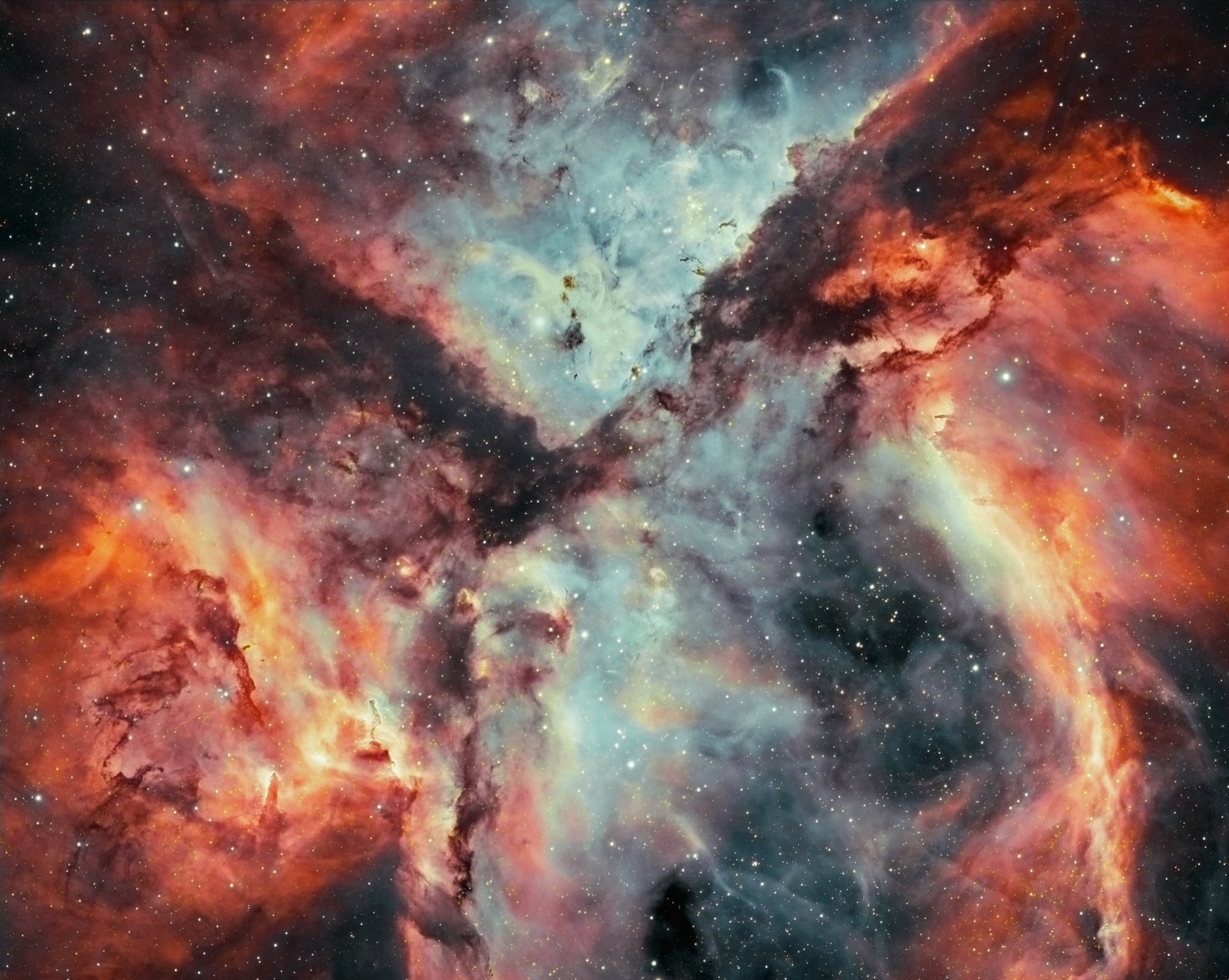 Stars, Gas, and Dust Battle in the Carina Nebula