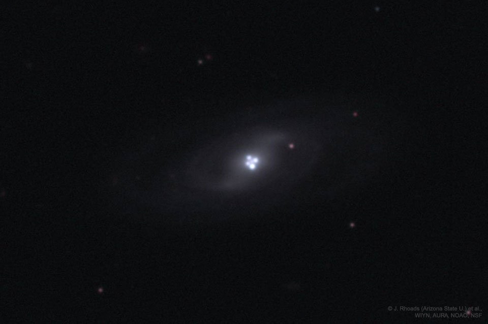 The Einstein Cross Gravitational Lens