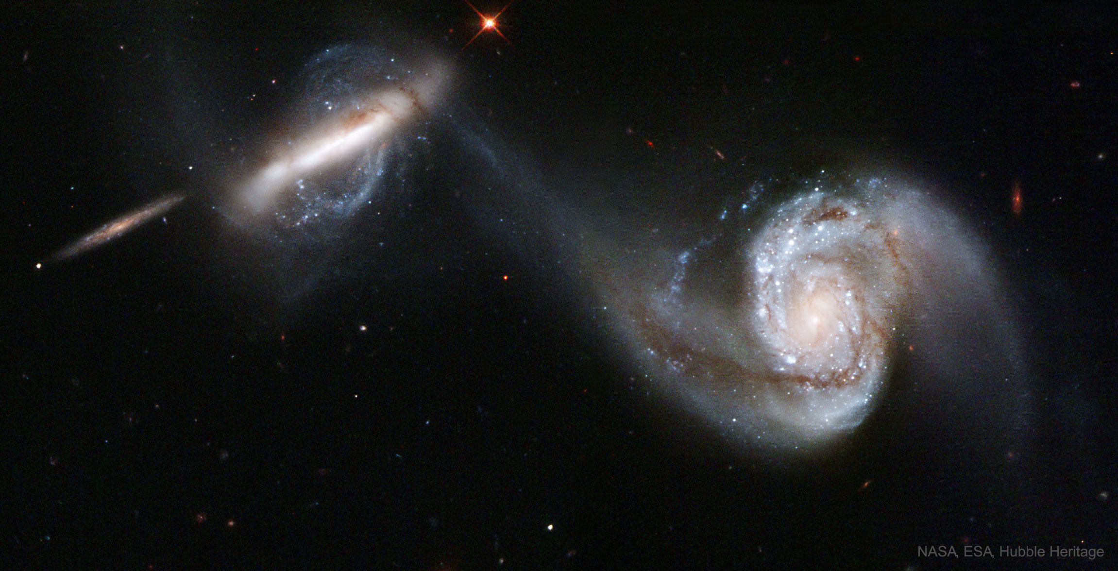 Arp 87: Merging Galaxies from Hubble