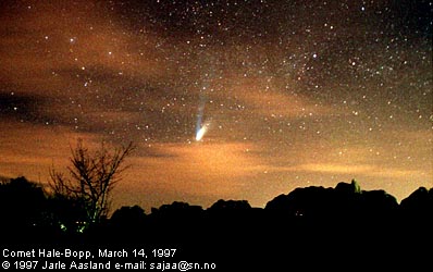 Earth, Clouds, Sky, Comet 
Credit and Copyright: