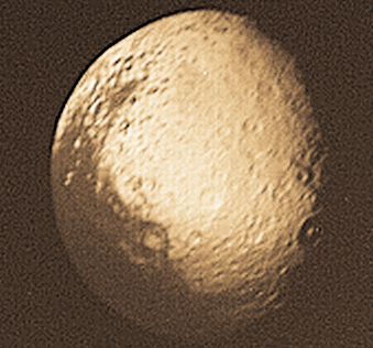 Iapetus: Saturn's Disappearing Moon